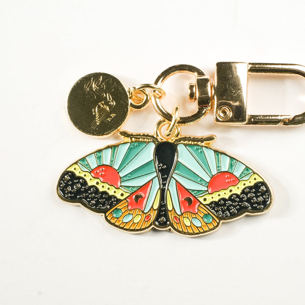 611fc05e3c4ce80992caae23_cosmic-moth-keychain-2_1790897078432.jpg