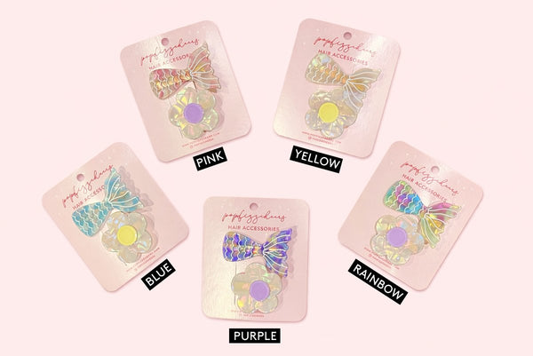 611fc05e3c4ce80992caae23_iridescent-hair-accessories-display-copy_1771223707041.jpg