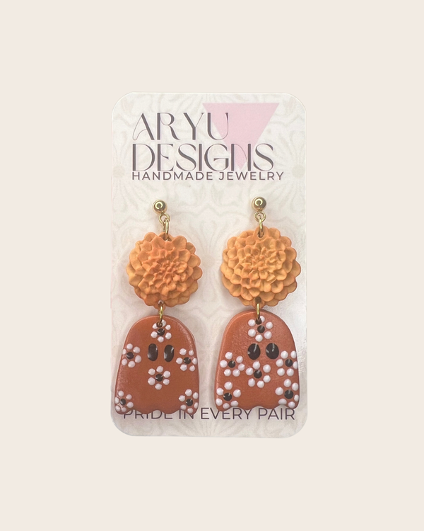 611fc05e3c4ce80992caae23_marigold-stacked-ghost-earrings-card_1790635450226.png