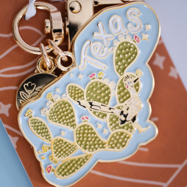 611fc05e3c4ce80992caae23_prickly-pear-and-road-runner-texas-keychain-packaging_1790817174174.jpg