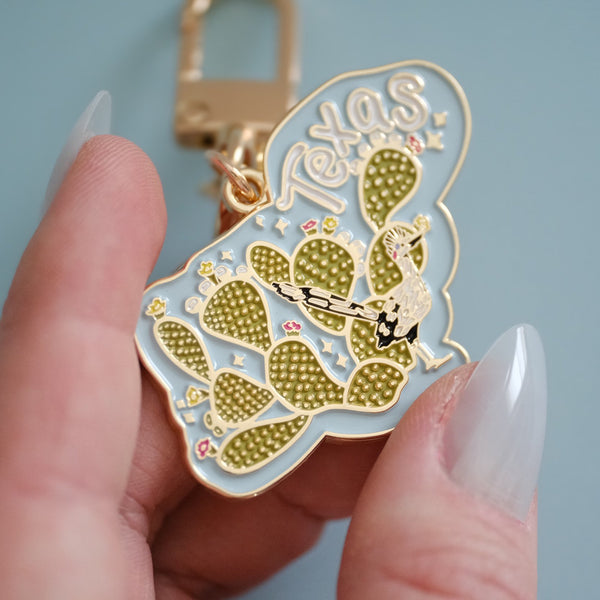 611fc05e3c4ce80992caae23_prickly-pear-and-road-runner-texas-keychain_1790817174174.jpg