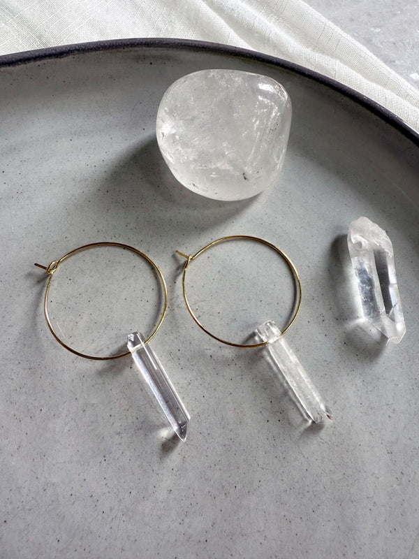 611fc05e3c4ce80992caae23_purity-earrings-clear-quartz-02_1750983536867.jpg