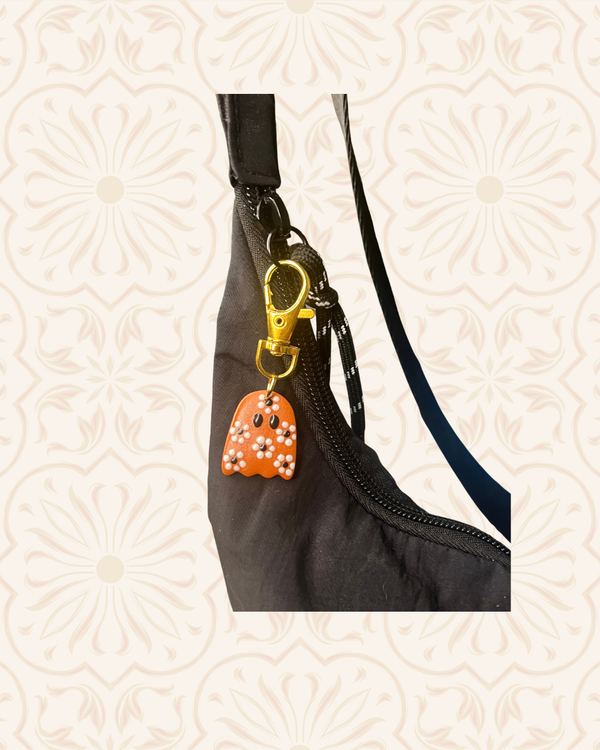 611fc05e3c4ce80992caae23_talavera-ghost-bag-charm-on-purse_1790634049272.png