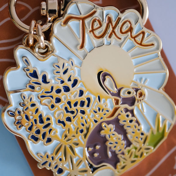 611fc05e3c4ce80992caae23_texas-white-tailed-rabbit-with-blue-bonnets-keychain-3_1790816408407.jpg