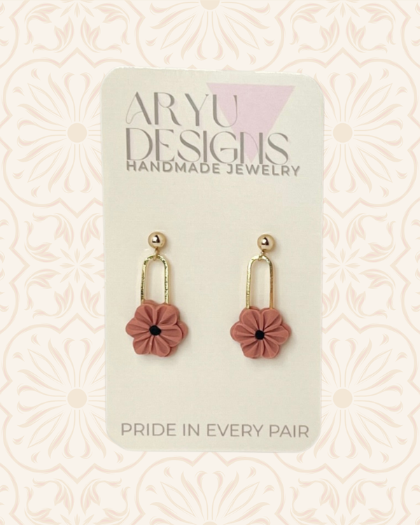 611fc05e3c4ce80992caae23_updated-bloom-clip-dangles-petal-on-card_1790709038792.png
