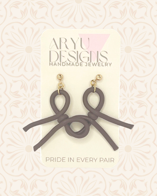 611fc05e3c4ce80992caae23_updated-bow-dangle-earrings-on-card-espresso_1790708269950.png